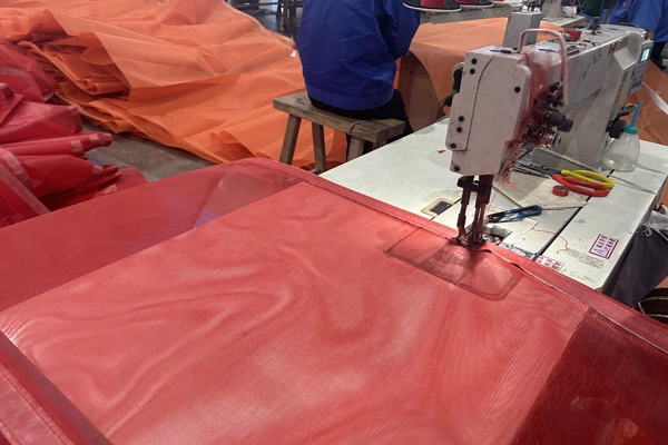 Application de la bâche de maille de PVC